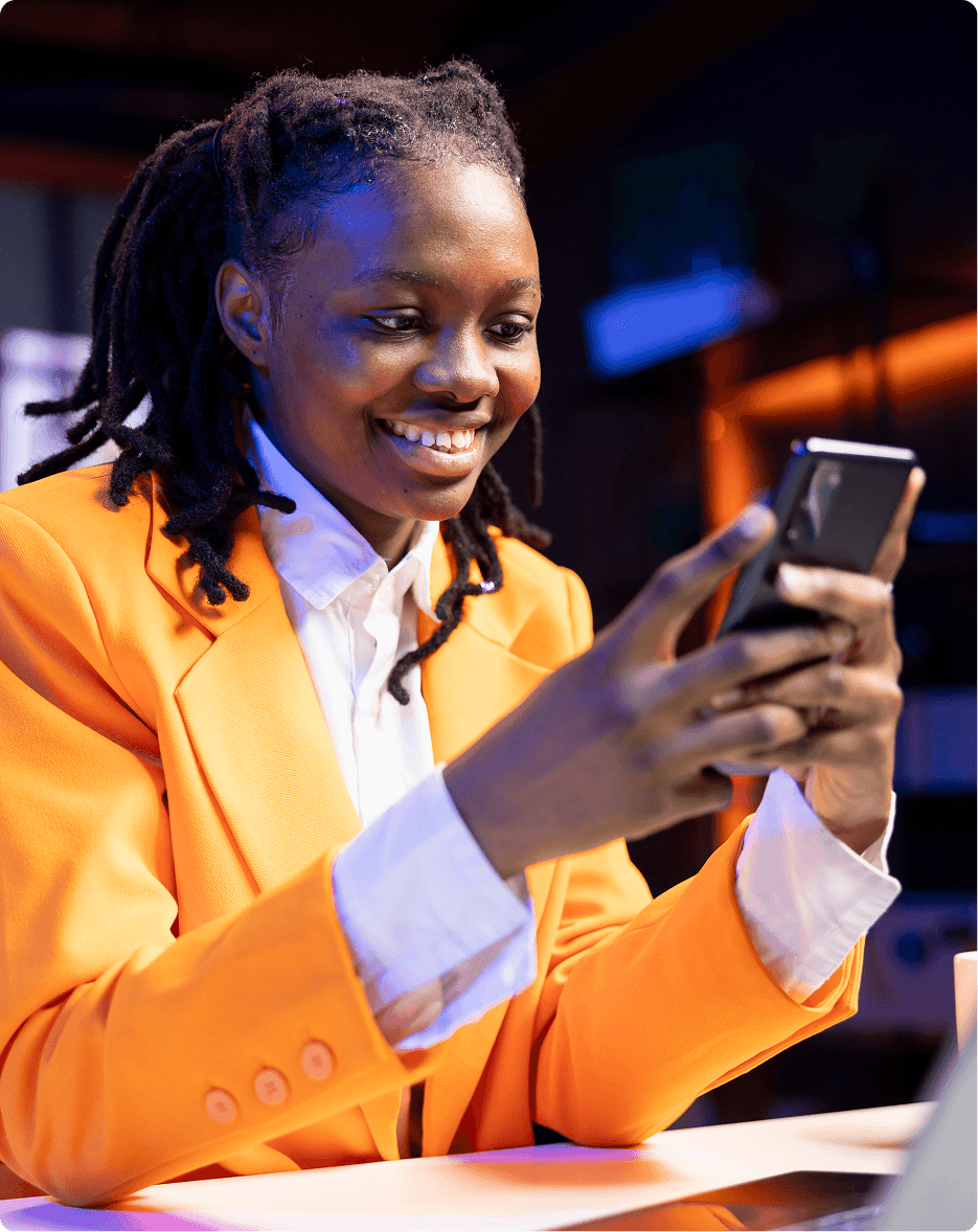 Woman smiling with phone