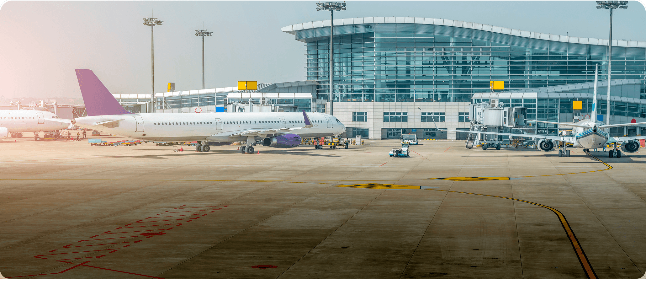 Airport runway with planes
